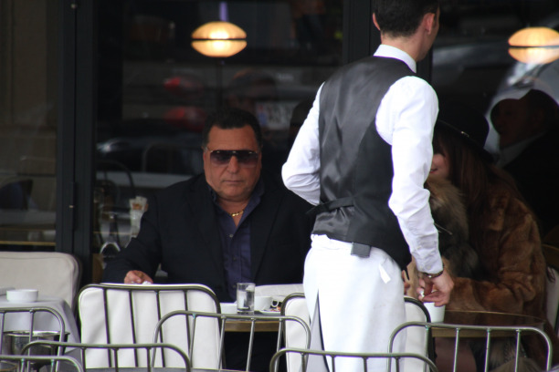 waiter serving a guest
